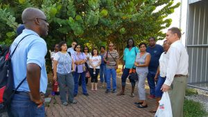 Members of the tour listening attentively to Mr. Beadon